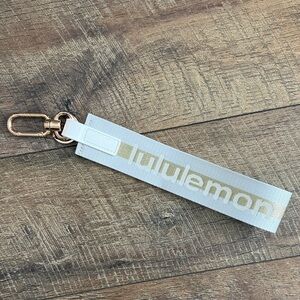 lululemon athletica White and Gold Keychain